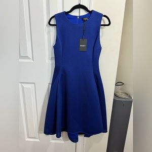 Royal blue DKNY dress with pockets. Sleeveless size 4